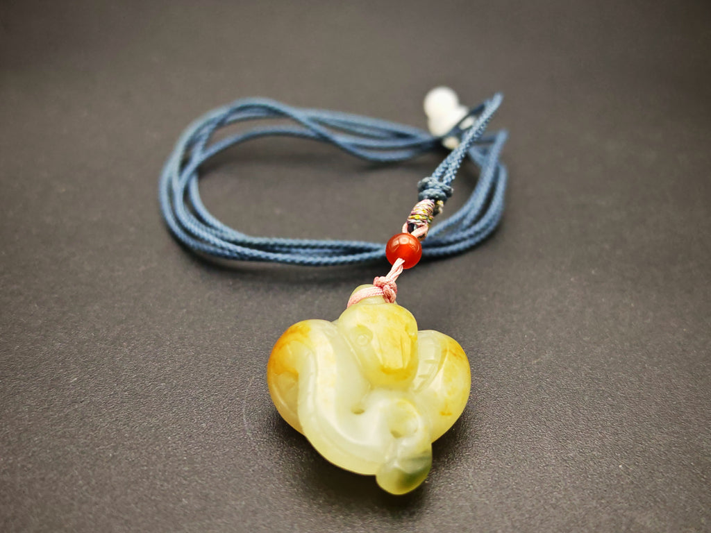 Xinjiang — Hetian Jade Single-Pebble Carving, Three-Colour Serpent