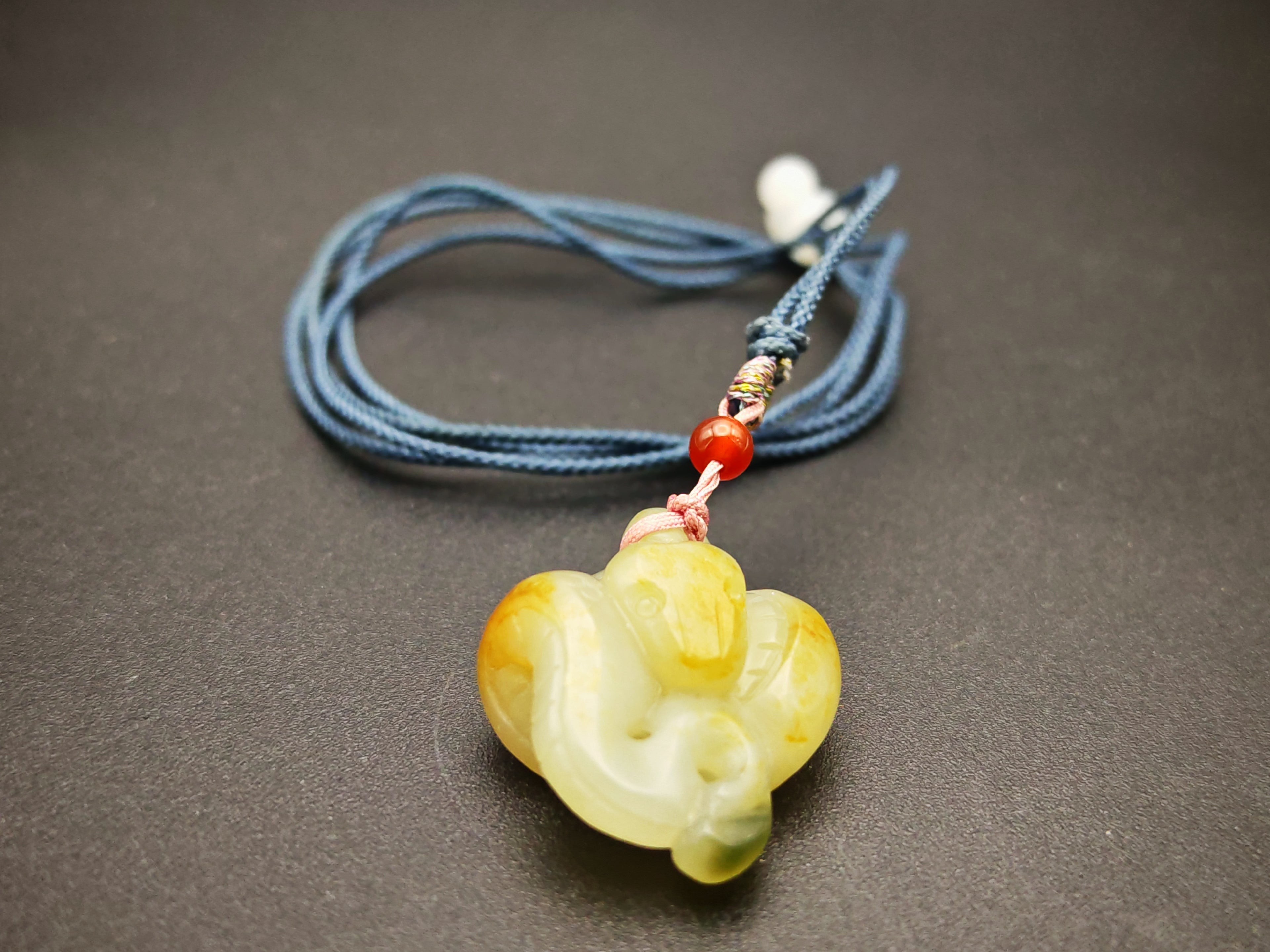 Xinjiang — Hetian Jade Single-Pebble Carving, Three-Colour Serpent