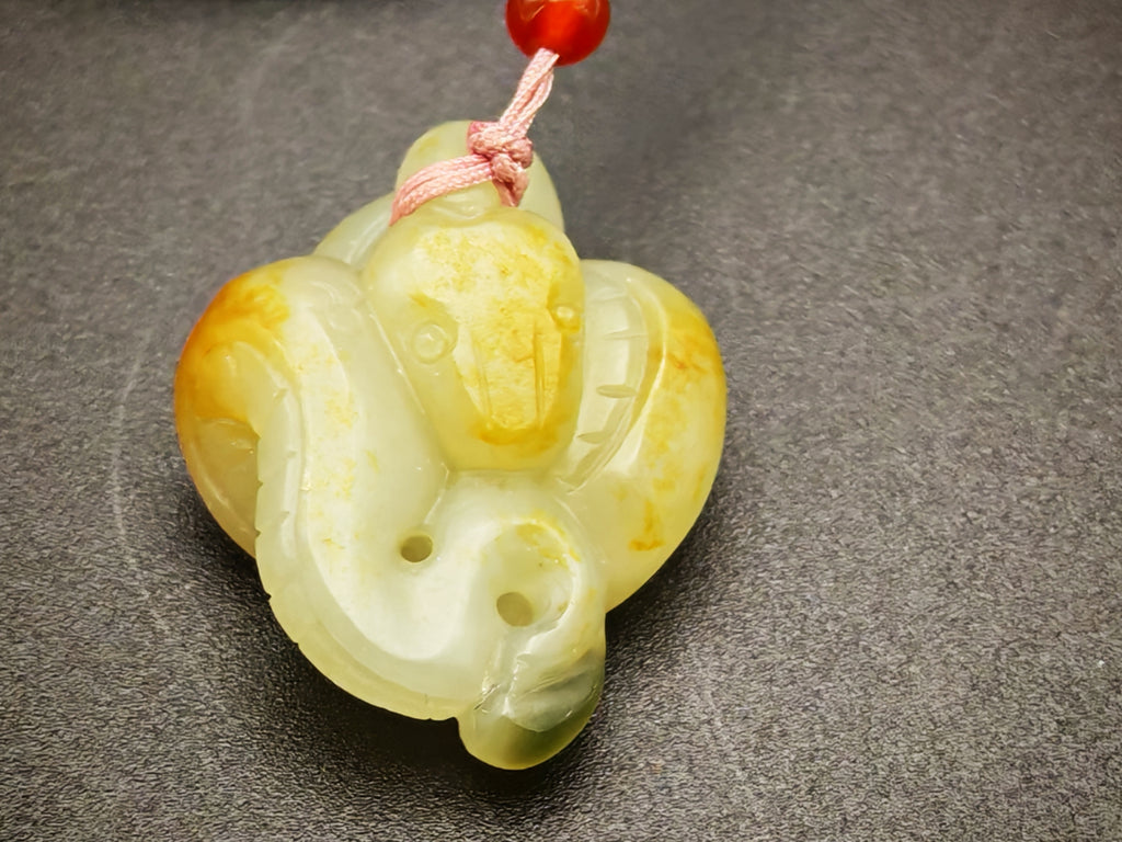 Xinjiang — Hetian Jade Single-Pebble Carving, Three-Colour Serpent