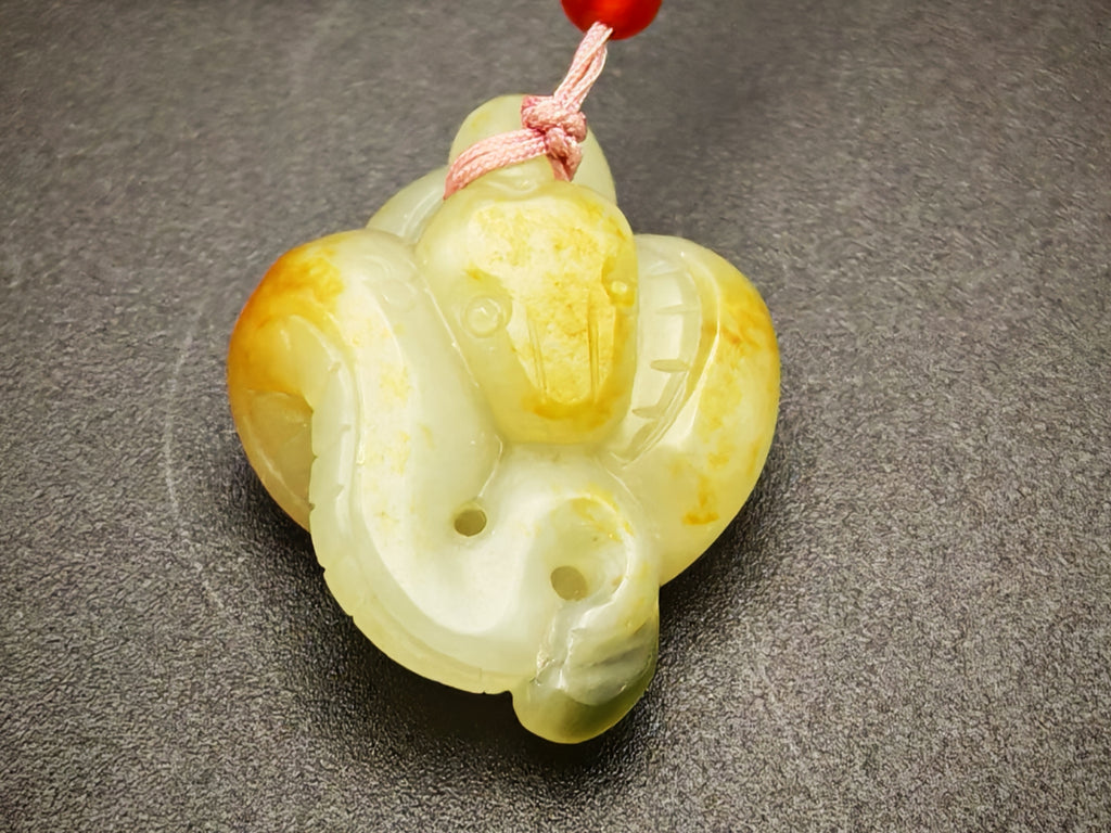 Xinjiang — Hetian Jade Single-Pebble Carving, Three-Colour Serpent